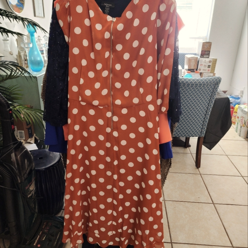 Womans 24 orange and white dress.